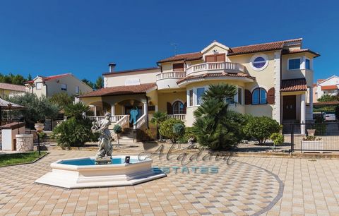 A grand holiday villa in the heart of Vodice, a true Mediterranean hacienda. It extends over three floors with 393 square meters of living space, of very solid and robust construction, generously equipped and lavishly furnished. In the basement lies ...