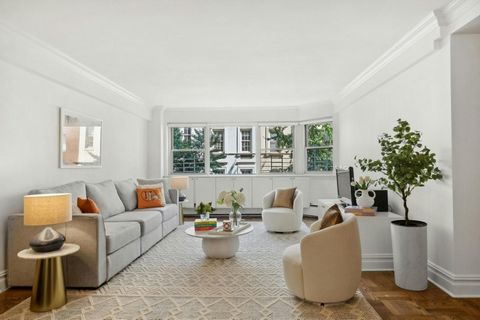 Experience the elegance of this rarely available 2-bedroom, 2-bathroom apartment situated in a full-service building on a tranquil, tree-lined block just west of Lexington Avenue. The apartment offers an expansive and inviting living area, perfect fo...