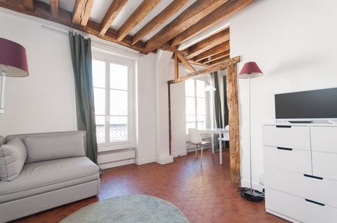 Lovely studio located on the 4th floor in a building with majestic stairs, close to the very center of Paris. The apartment features a living room with 2 windows making it particularly bright. It’s equipped with a double bed for 2 and convertible sin...