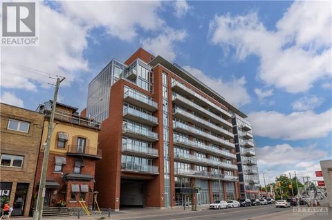 *1 rented parking spot is available with this unit. Welcome to Central 1 Condominiums - right in the heart of Centretown! This lovely two-bed, two-bath condo offers an open-concept layout, perfect for entertaining. Hardwood floors throughout and floo...