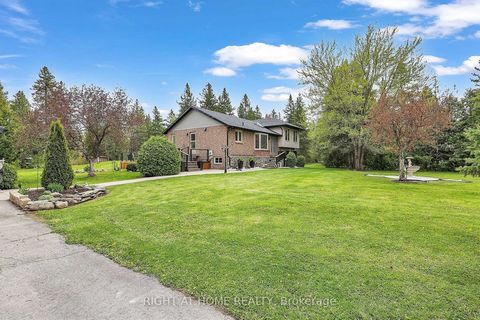 Unprecedented privacy! Step into your own slice of paradise at Paradise House! Nestled on a tranquil 2.47-acre lot steps away from the serene shores of Sturgeon Lake, this newly renovated custom-built 4 Level Side Split Bungalow invites you to indulg...