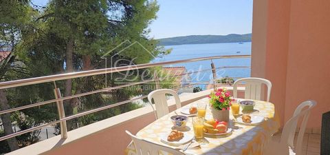 For sale is an apartment located on the first floor of a small residential building in Trogir. The building has four floors (ground floor, first floor, secnd floor and attic) and has a total of 14 residential units. The apartment for sale consists of...