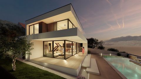 Een prachtige luxe villa met een verlicht infinity infinity pool te koop, eerste rij naar de zee op het eiland Pag. De netto gebruiksoppervlakte van de villa is 184,24 m2 en is gelegen op een perceel van 521 m2. Het bestaat uit begane grond en één ve...