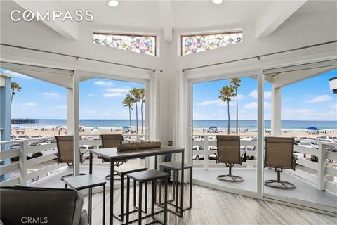 2212 W. Oceanfront – Coastal Living with Endless Possibilities Perfectly situated on the sand in the heart of Newport Beach, this stunning five-bedroom, five-bathroom duplex offers approximately 3,000 square feet of light-filled living space and unob...