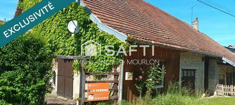 Maison mitoyenne en pierre au coeur du village de Alaise.